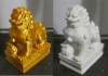 Lion statue.... gold and marble.png