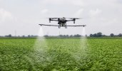 agricultural spraying drone flying.jpg